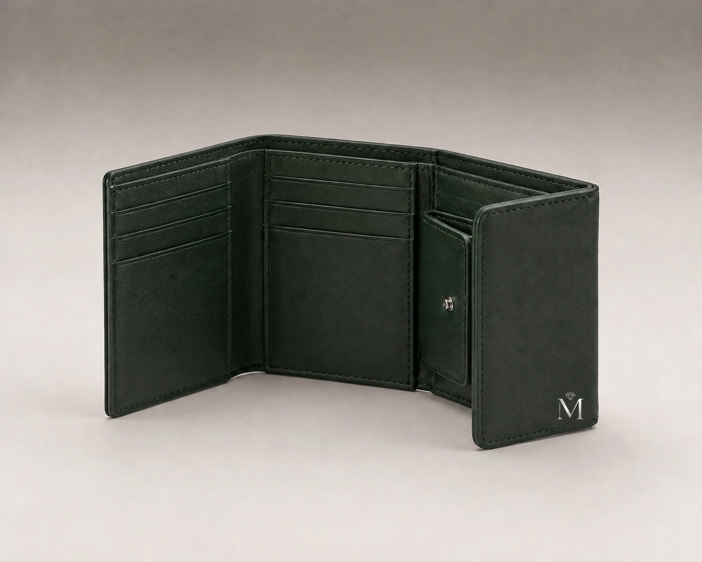 Deep green leather trifold wallet open to show card slots and coin pocket
