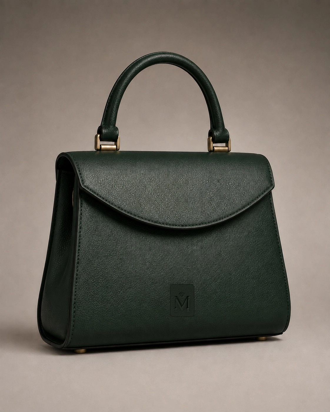 Deep green structured leather top-handle bag with flap closure